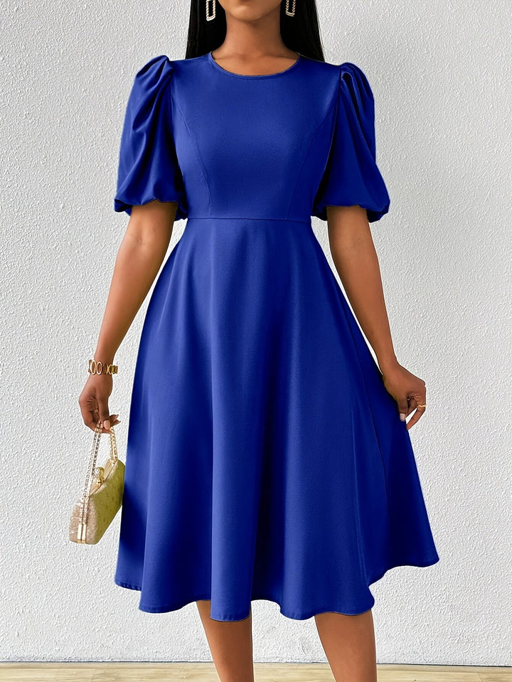 Clara Bloom | Refined black midi dress