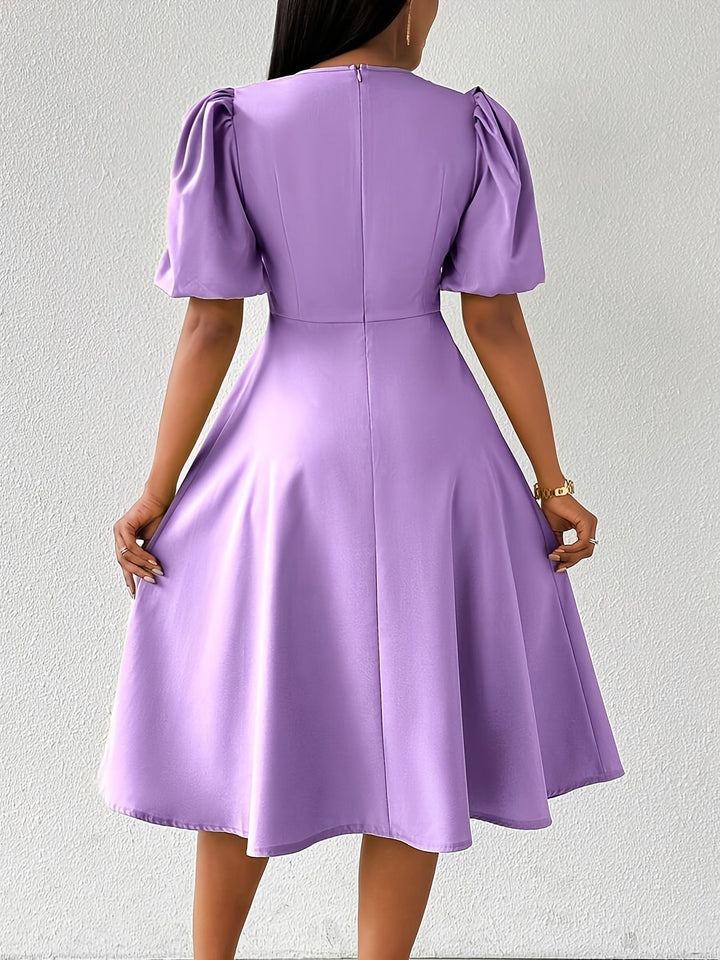 Clara Bloom | Refined black midi dress